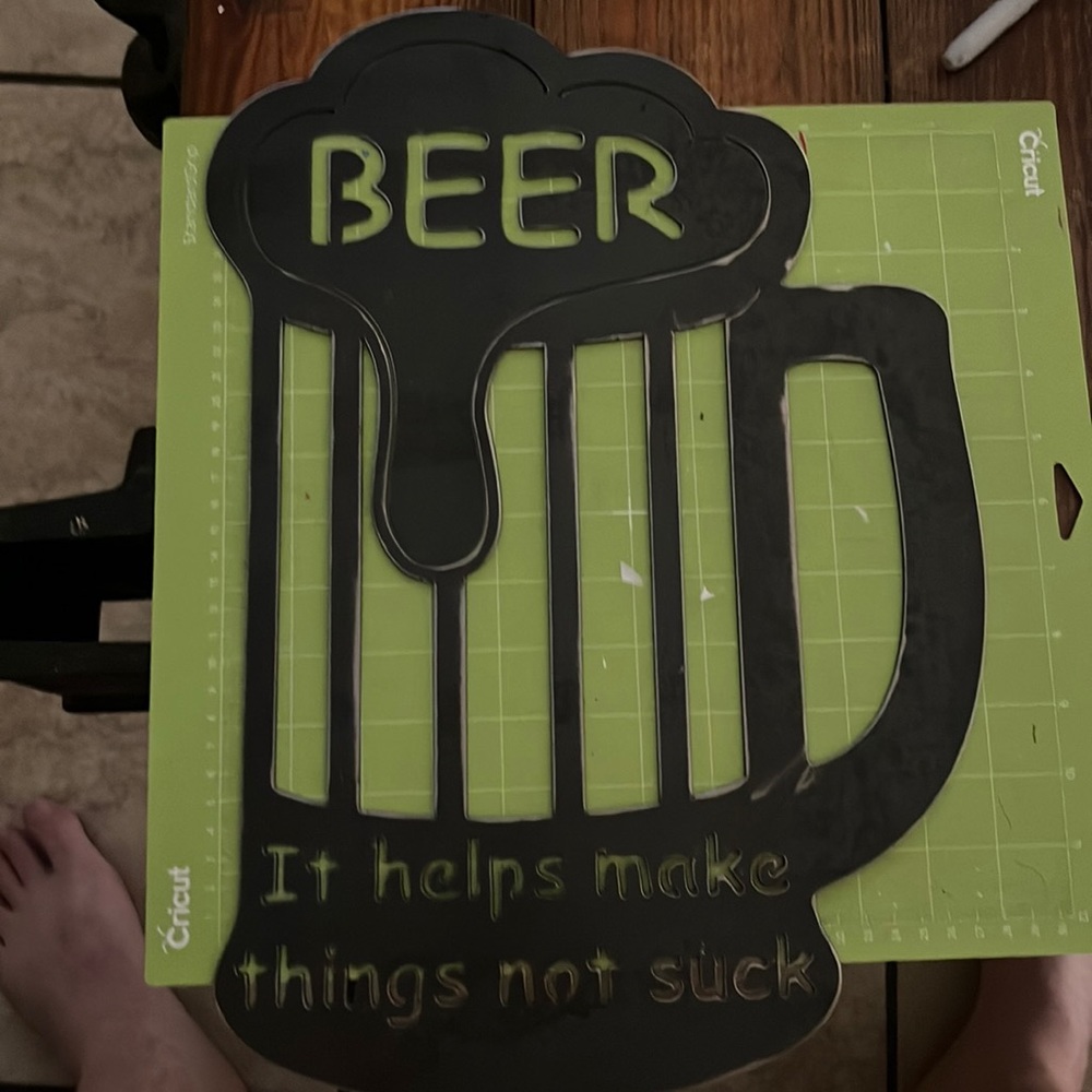 COPY - 17 x 11 1/2 metal shaped beer mug with a saying on the bottom.